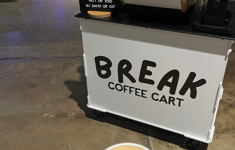 Break Coffee Cart with a latte featuring a logo printed onto the foam.