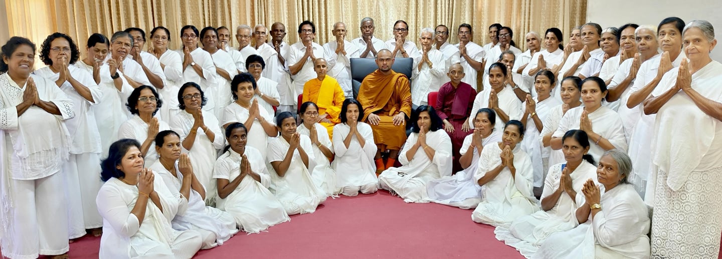 a group of people standing around a circle of people