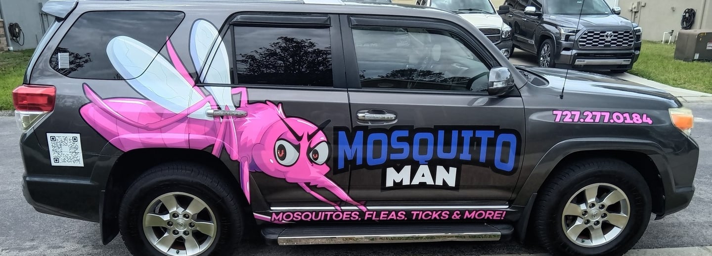 Mosquito Man mosquito control service vehicle serving local neighborhoods