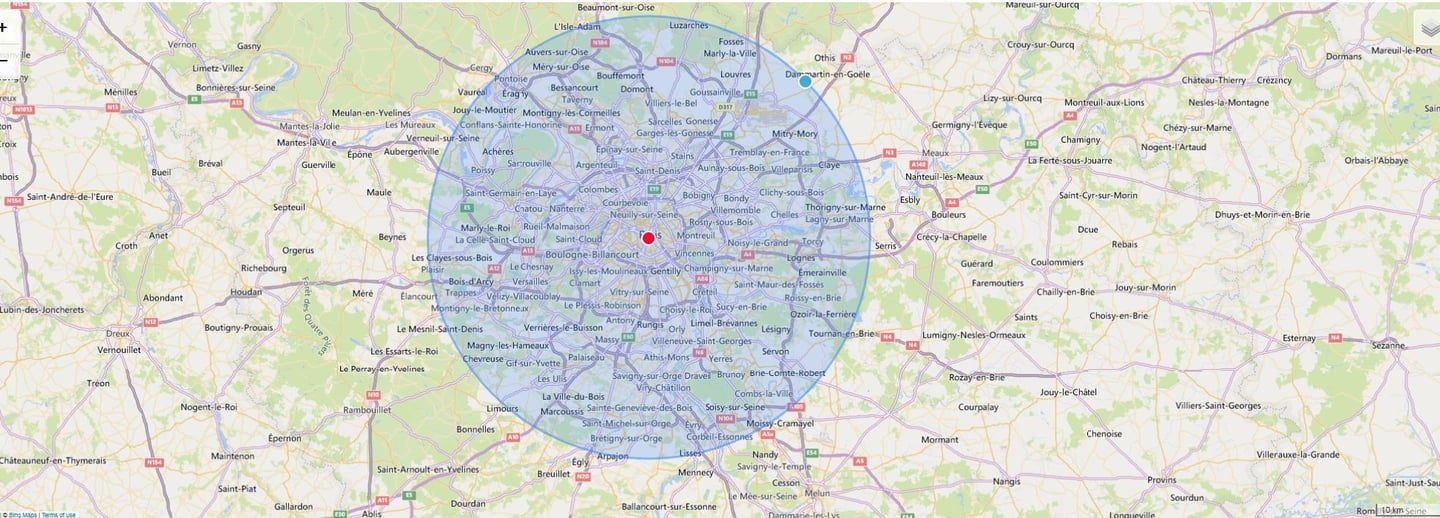 Carte montrant une zone de couverture autour de Paris avec un point central en rouge et un cercle bleu indiquant un rayon d’i