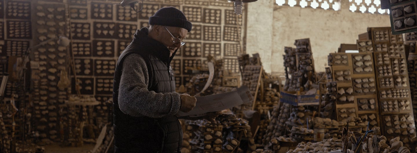 Luigi Lineri is working at "La Ricerca" in his atelier.