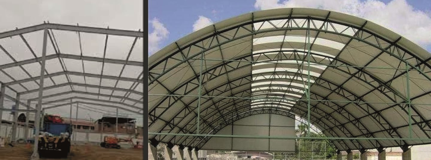 Steel frame construction and a finished arched metal roof structure for a sports court pavilion.
