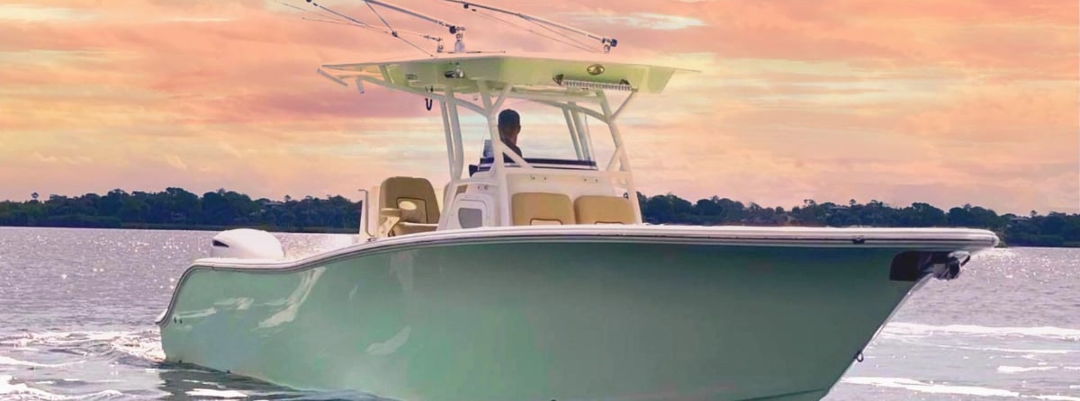 a man fishing on a boat in the water