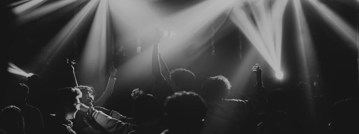 People dancing to a 3 Monkeys Music dj with disco lighting