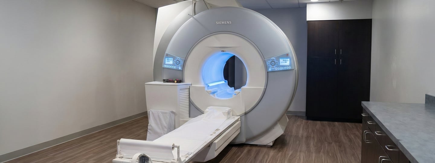 MRI scanner in a medical imaging room used for brain, spine, and neurological diagnostic testing.