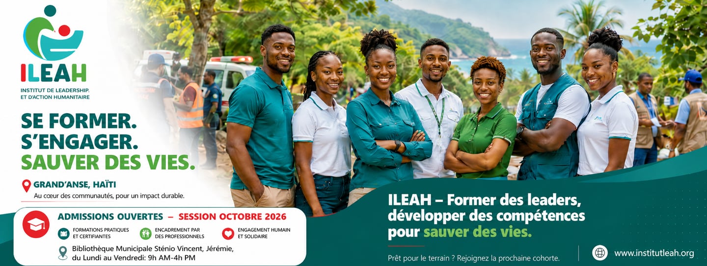 A group of smiling ILEAH leadership and humanitarian action students in Jeremie, Haiti, posing for a program banner.