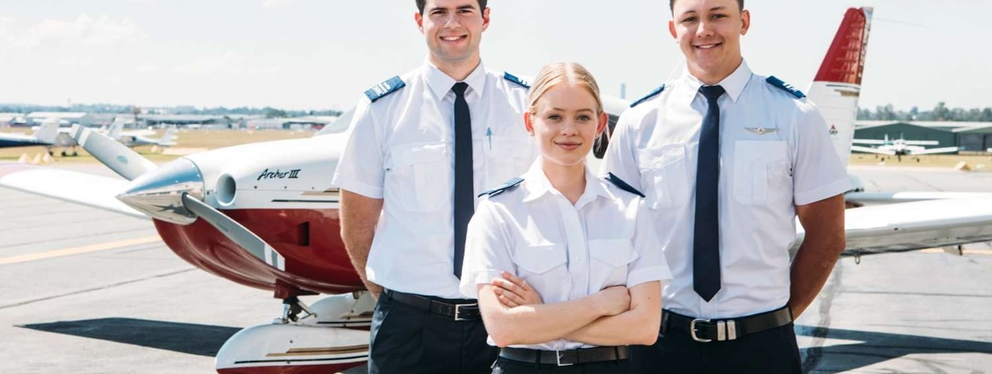 Student pilot in cockpit during flight training at sunrise with navigation instruments visible.
