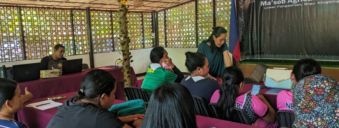 "Consultant conducting a workshop with clients, focusing on social and sustainable development" 