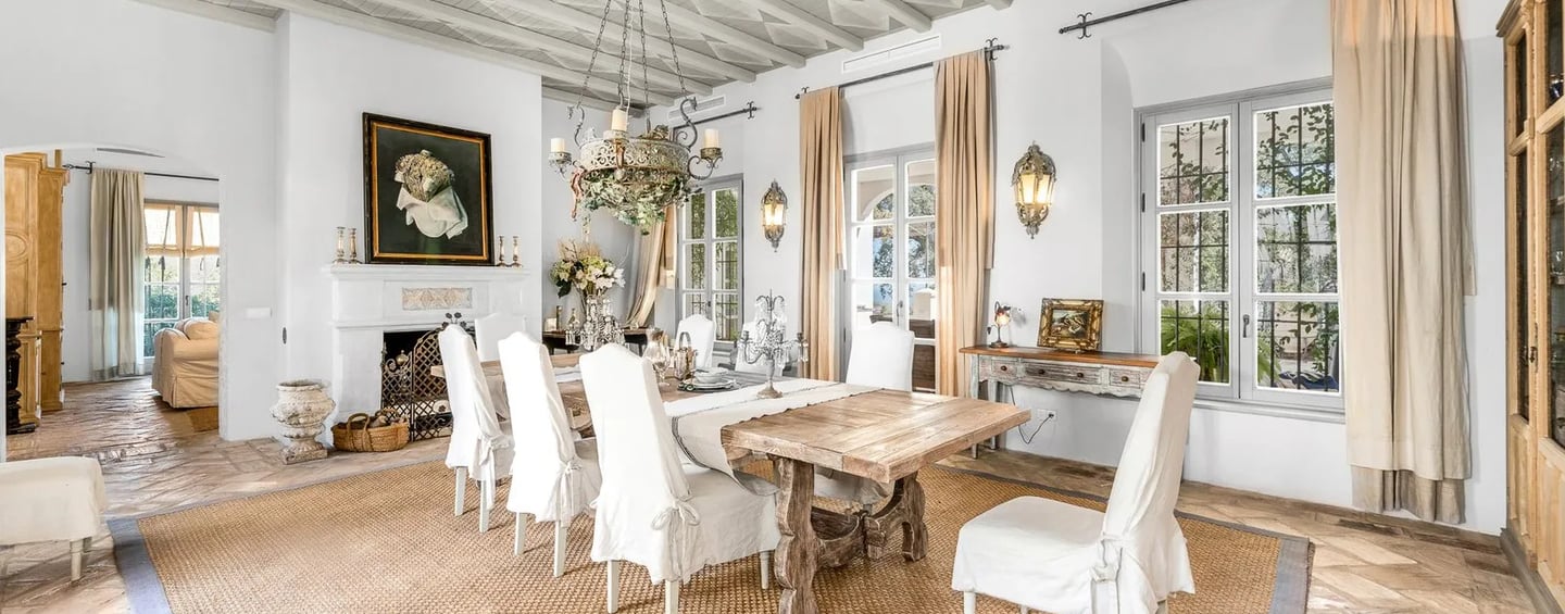 Elegant dining room with rustic beams at Finca Santa Katerina