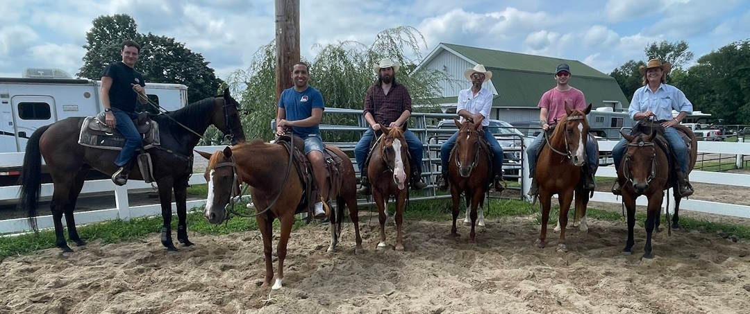 six horseback rides in an outdoor arena