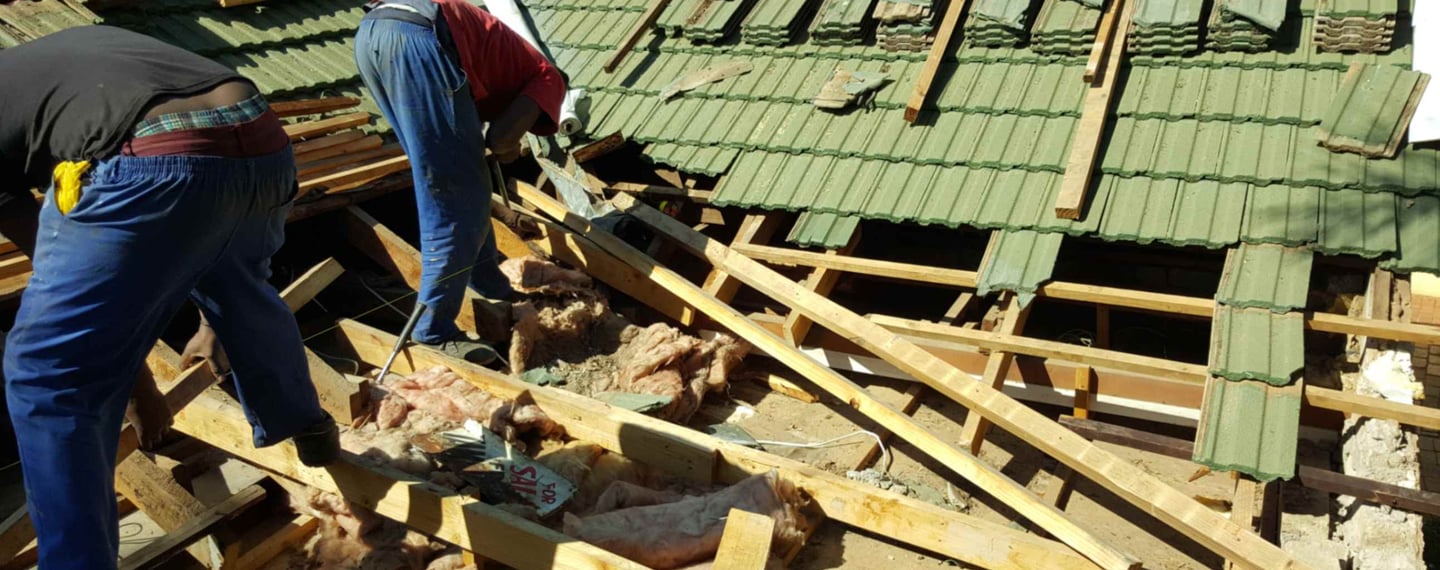 Resetting of roof valley to ensure adequate flow of water, Blairgowrie, Johannesburg