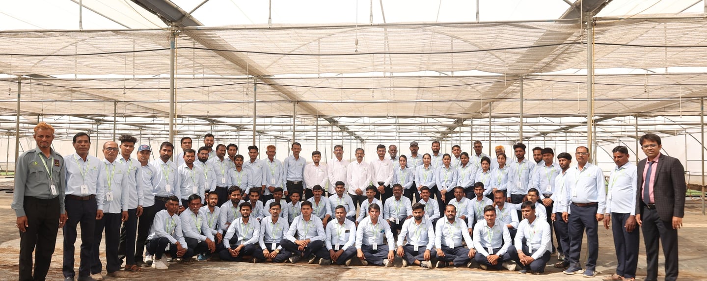 a group of people standing in a large room