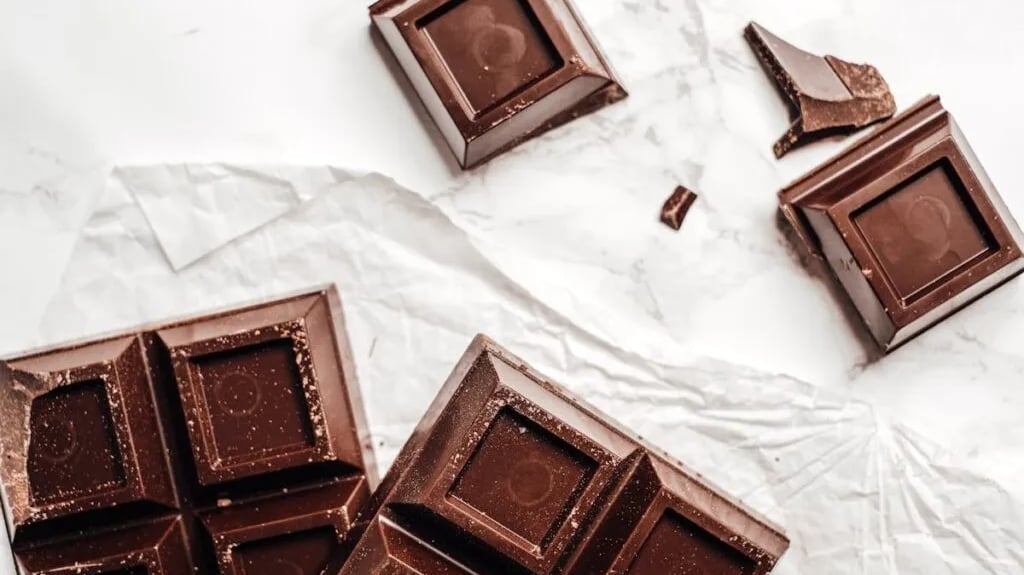 Chocolate bars on a white surface