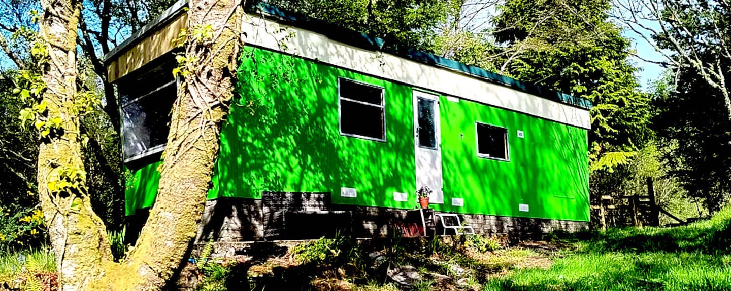 Residency accommodation in Tayvallich, Scotland, surrounded by coastal woodland and Atlantic rainfor