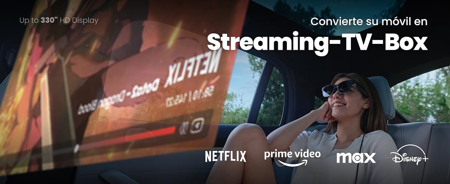 a woman sitting in a car watching tv