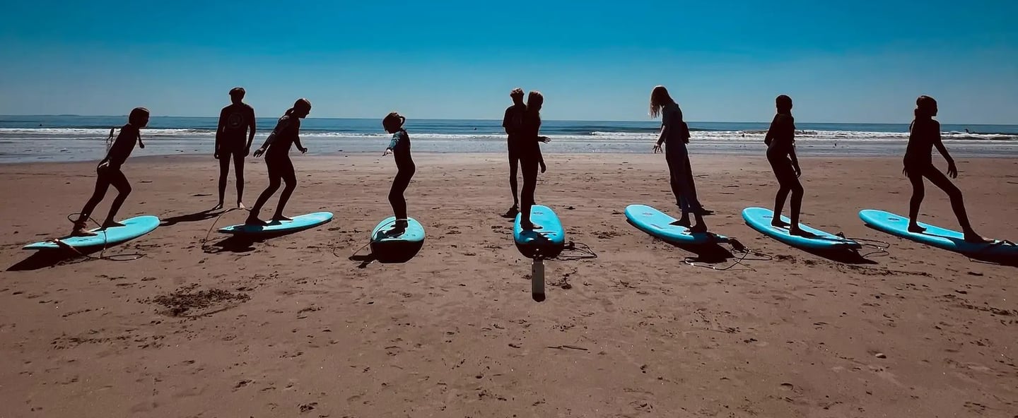Family surf lesson at The Wall in Hampton, New Hampshire with E Street Surf School