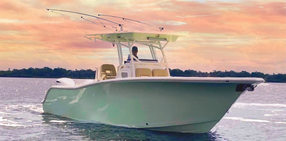 a man fishing on a boat in the water