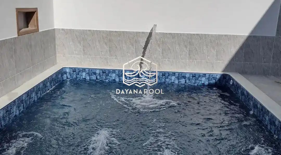 kolam renang buatan dayanapool di abndung dengan finishing batu alam sukabumi hijau