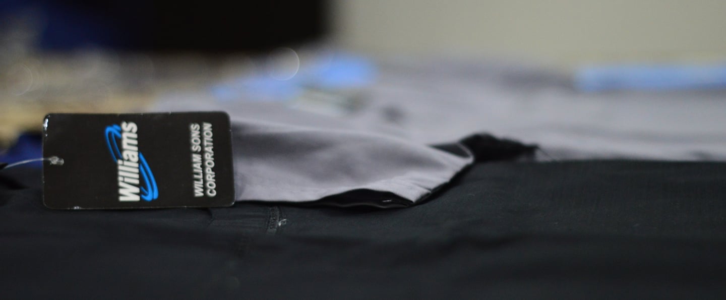 a small cardigane with a credit card attached to it