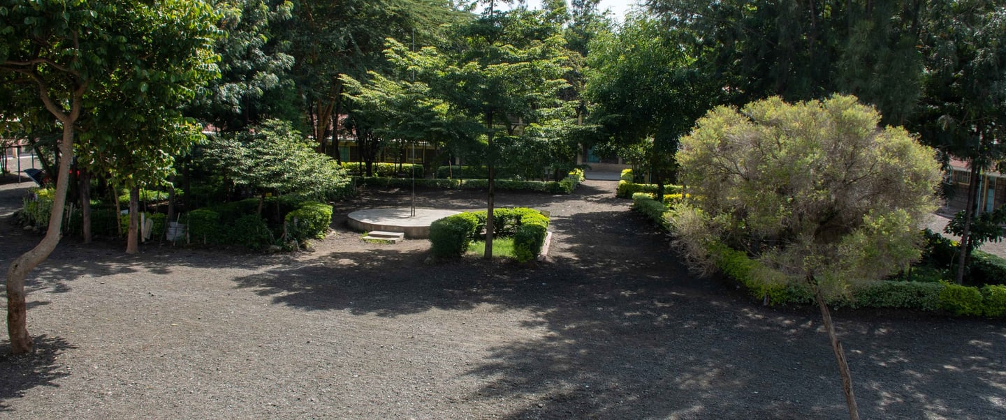 Tumaini House School - green assembly ground