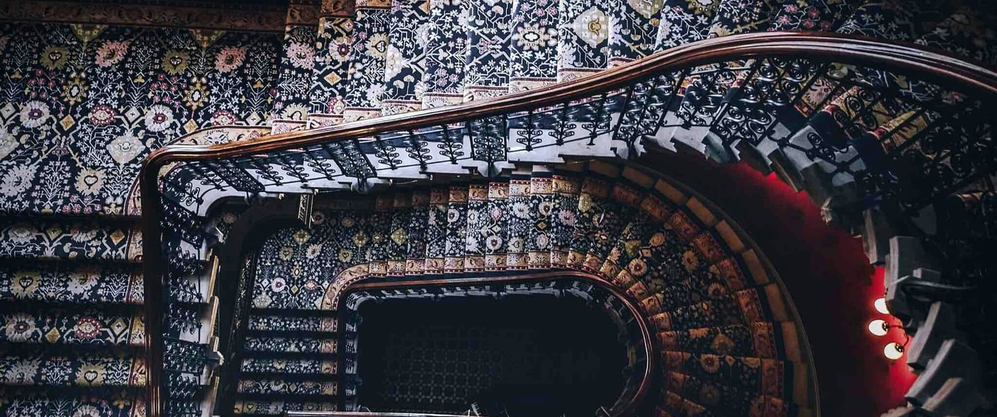 a spiral staircase way with a staircase casement