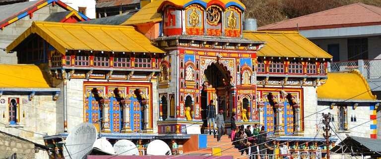 a large building with a yellow roof and a yellow roof