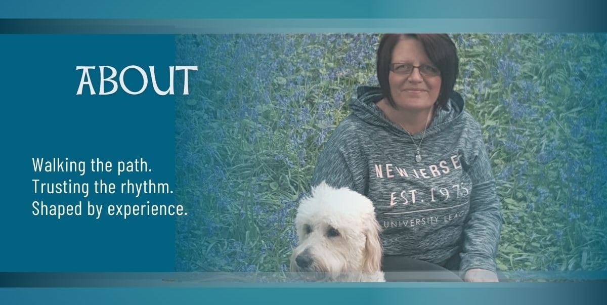 About page banner image showing Sonia Parker seated in a wildflower meadow with her dog beside her, 