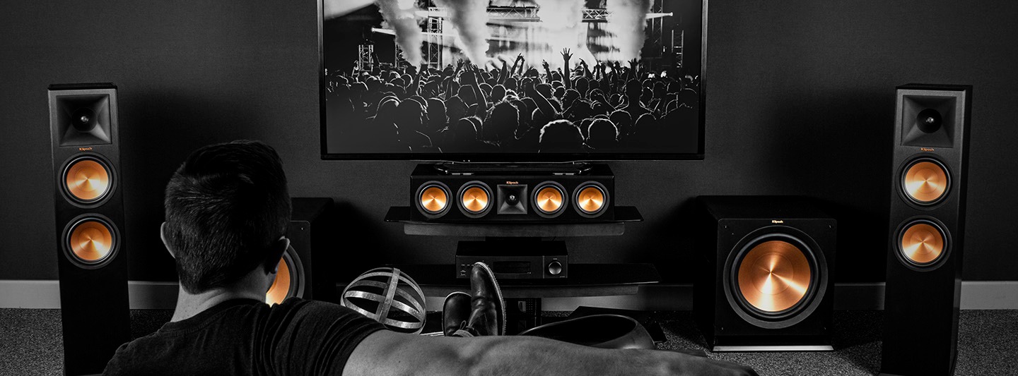 High-end home cinema separates setup with AV processor, multi-channel power amplifiers, and 4K sourc