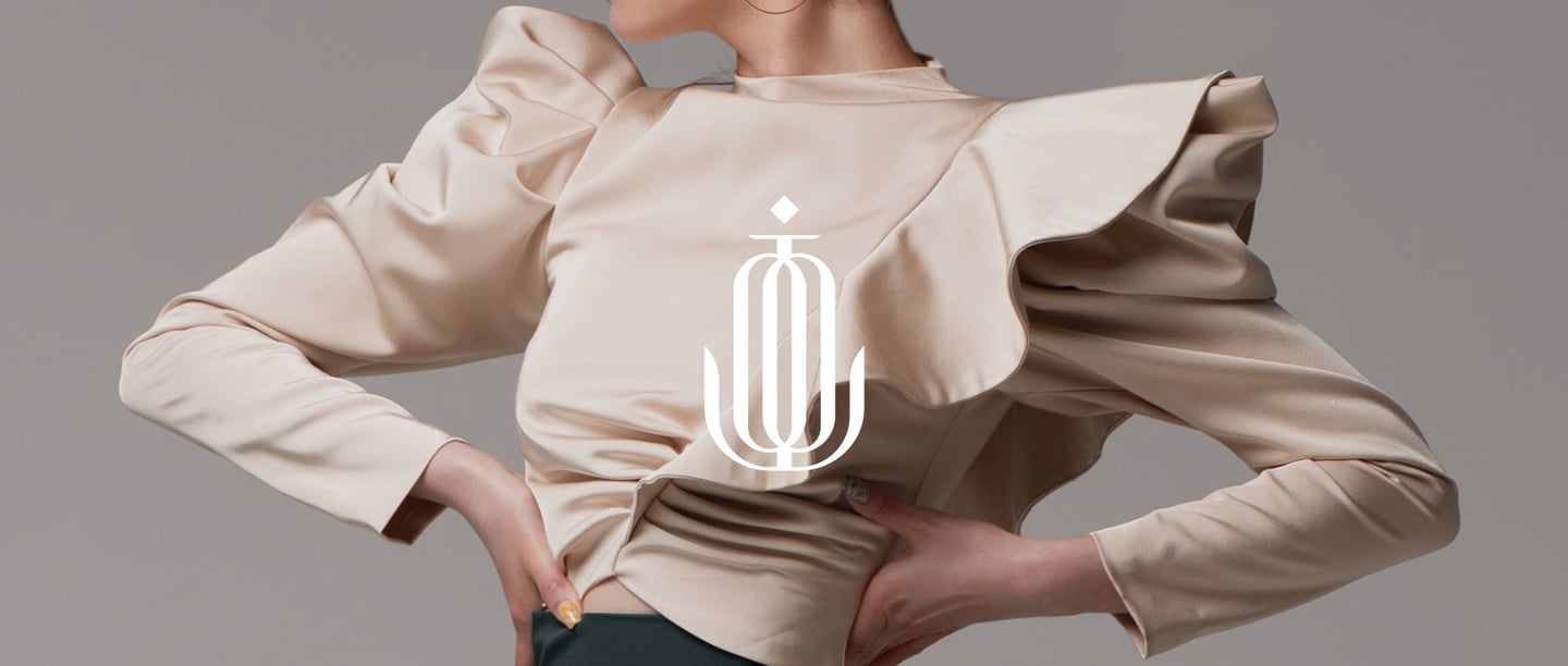 toto braz textile symbol applied to a stylish image with a woman wearing stylish, beige clothes
