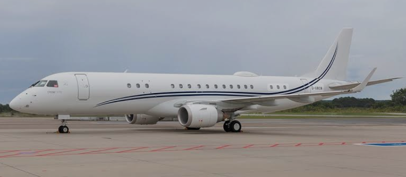 Embraer Lineage 1000 parked on the ramp waiting for it's next client