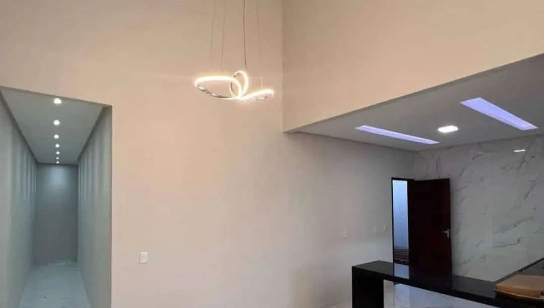 a room with a table and a table with a lamp