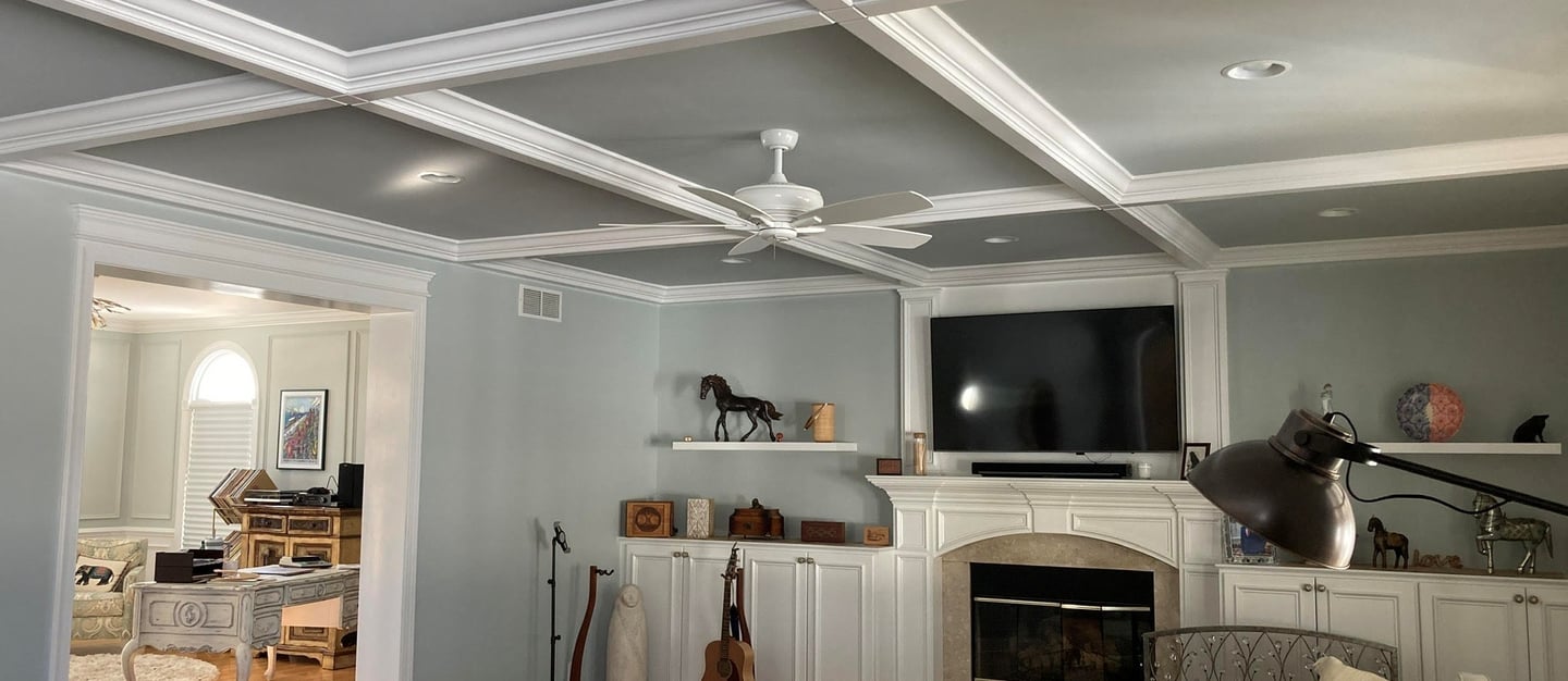 White coffered ceiling with gray inset panels installed in a Monmouth County living room