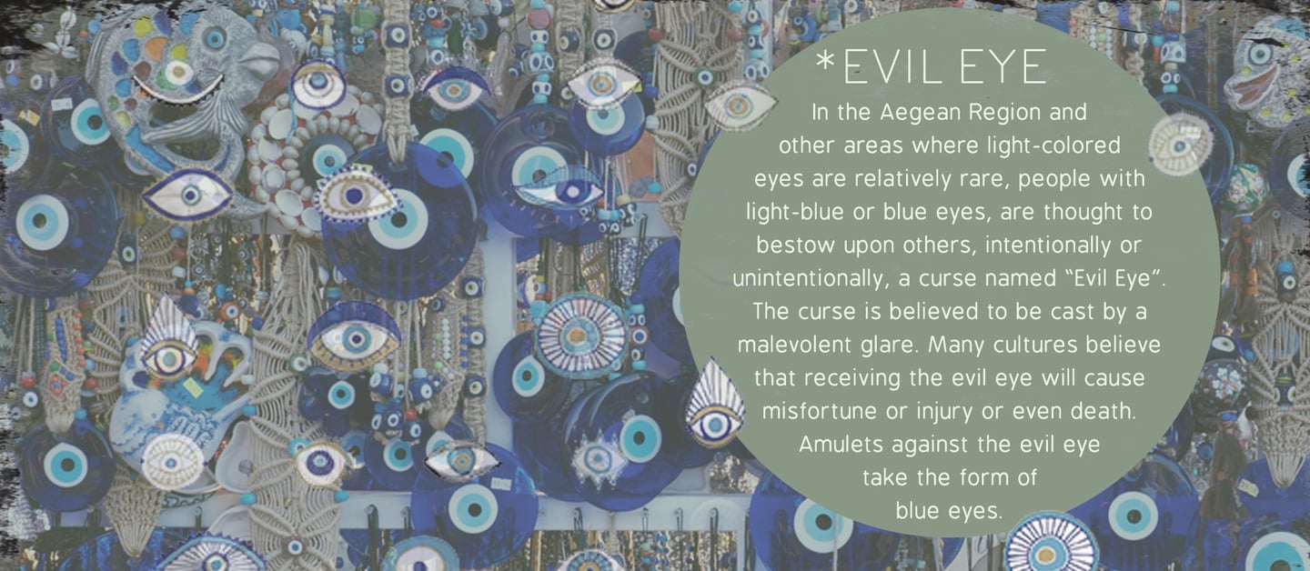 a wall hanging with evil eye eyeballs and evil eyeballs