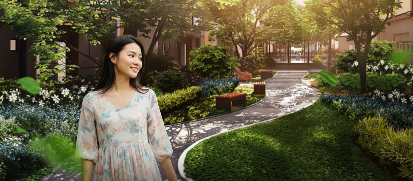 a woman in a dress standing in a garden