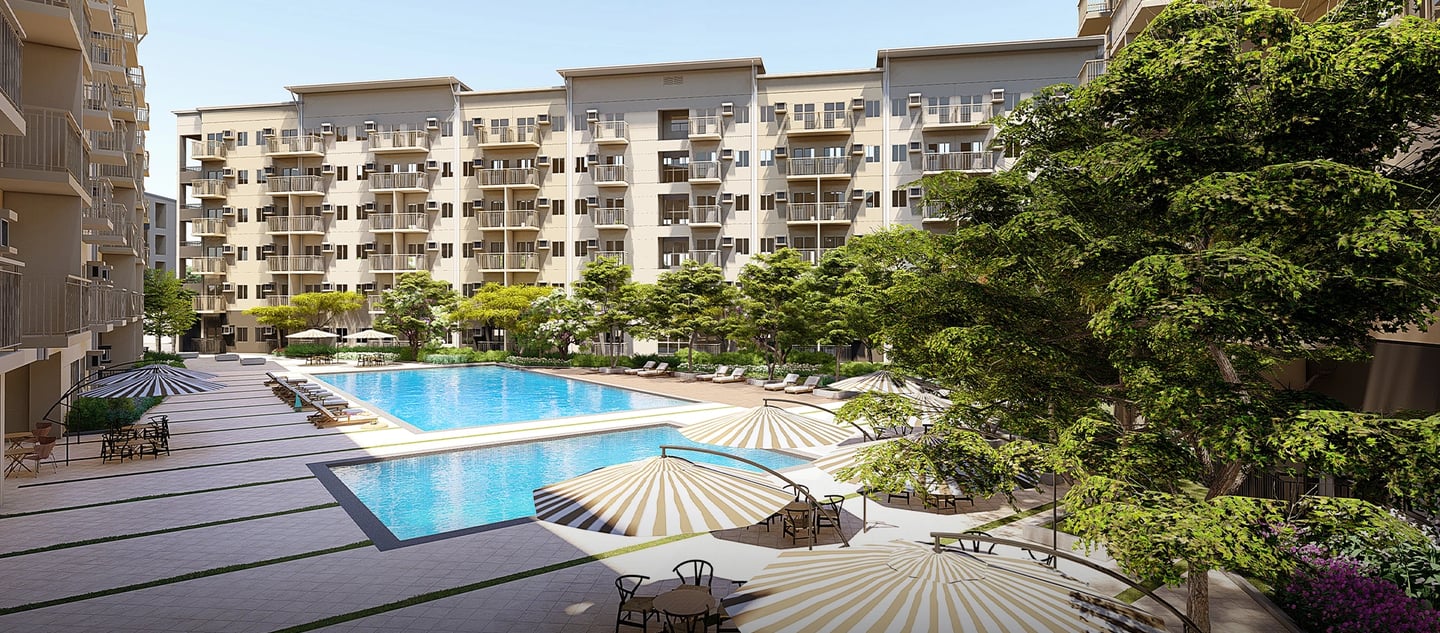 a pool with umbrellas and umbrellas in the sun