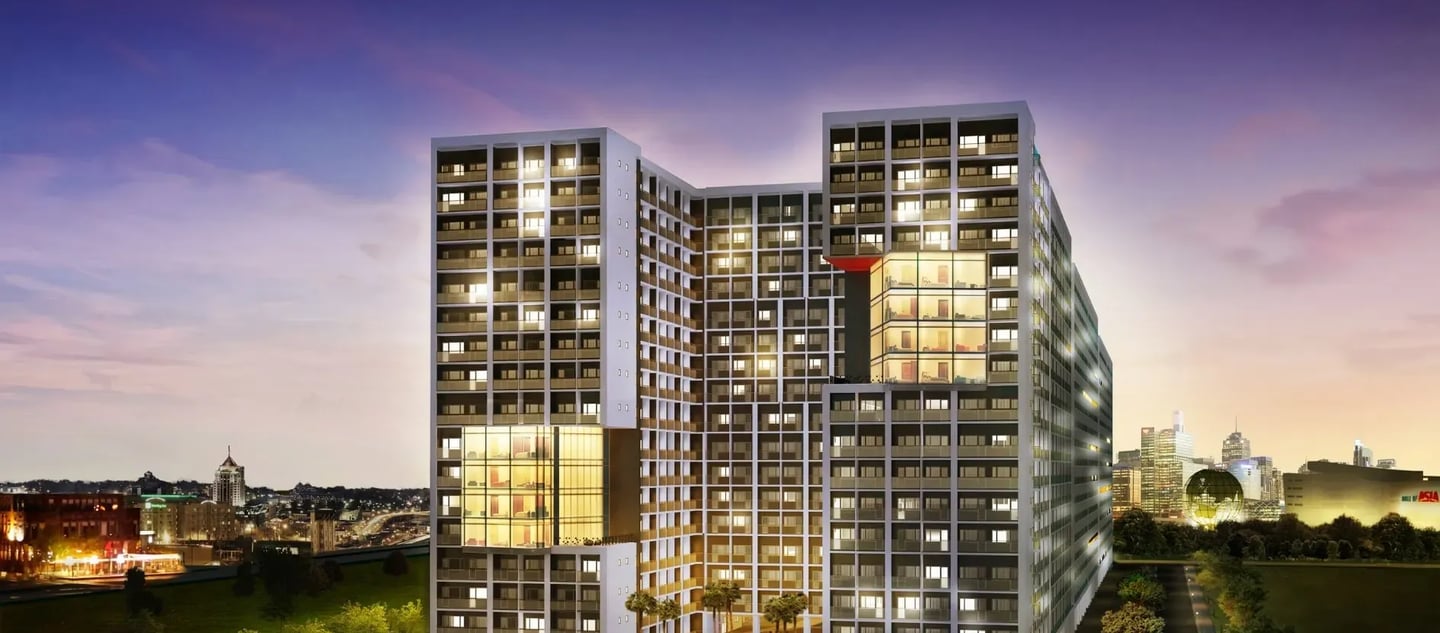 a tall building with a clock tower in the middle of it