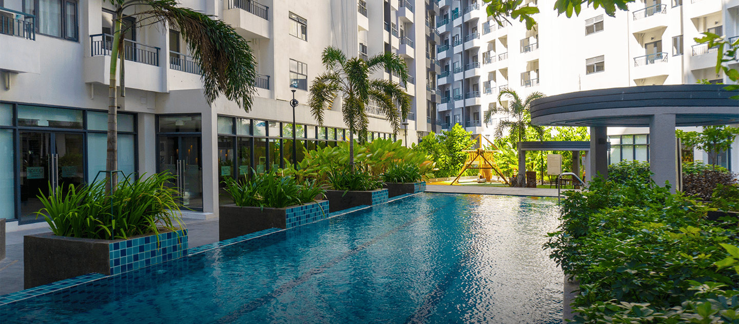 a pool with a view of a building