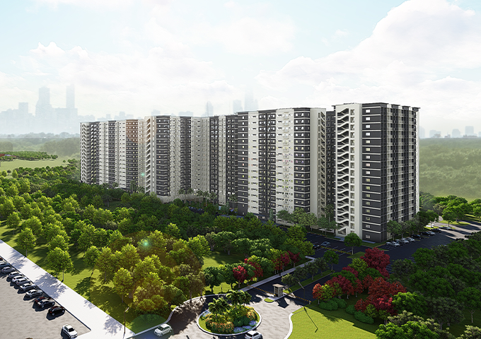 a large apartment complex with a parking lot and a lot of trees