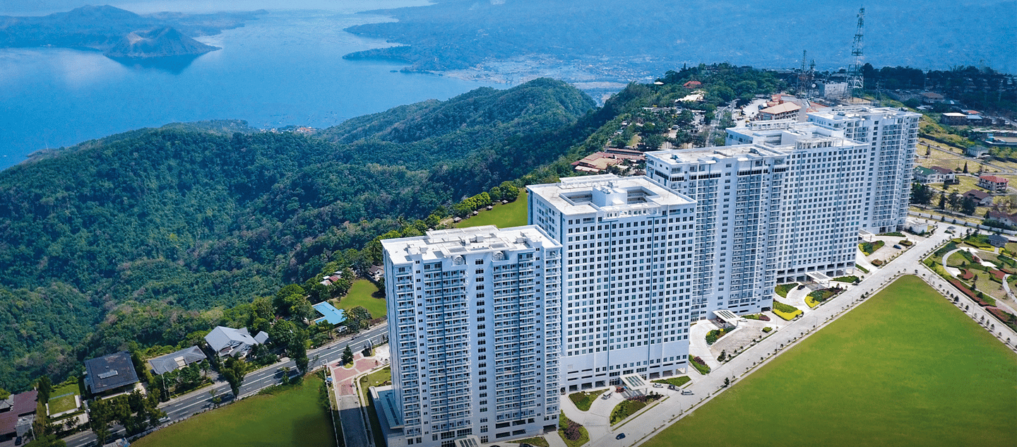 a large apartment complex with a soccer field and a soccer field