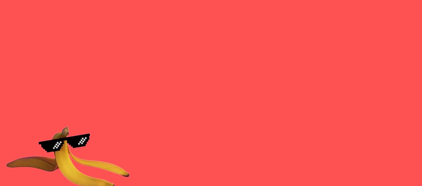 a banana peeler sitting on a pink background