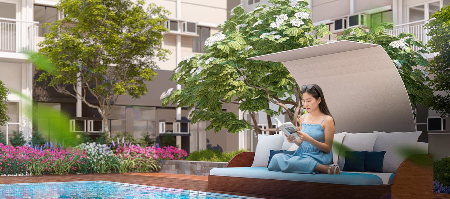 a woman sitting on a couch in a hotel room