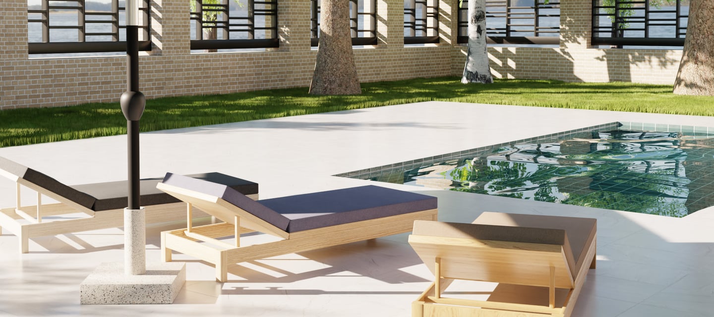 a patio with a pool and 3 sun lounger 