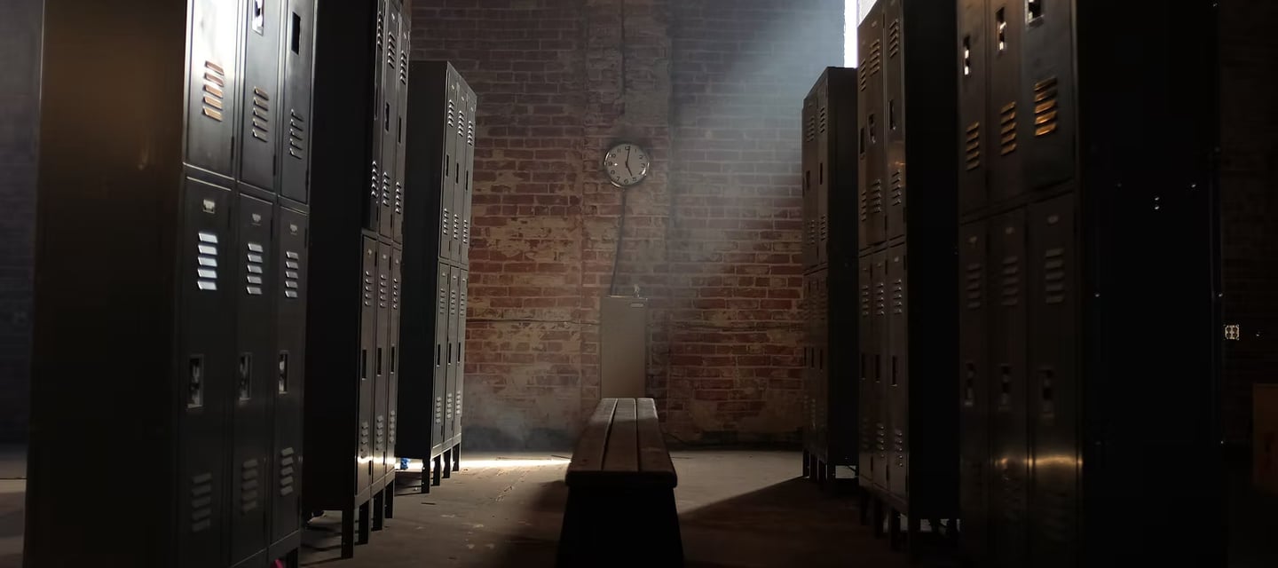 Locker room set at Grayfox Studios with benches, lockers, and sports-inspired atmosphere