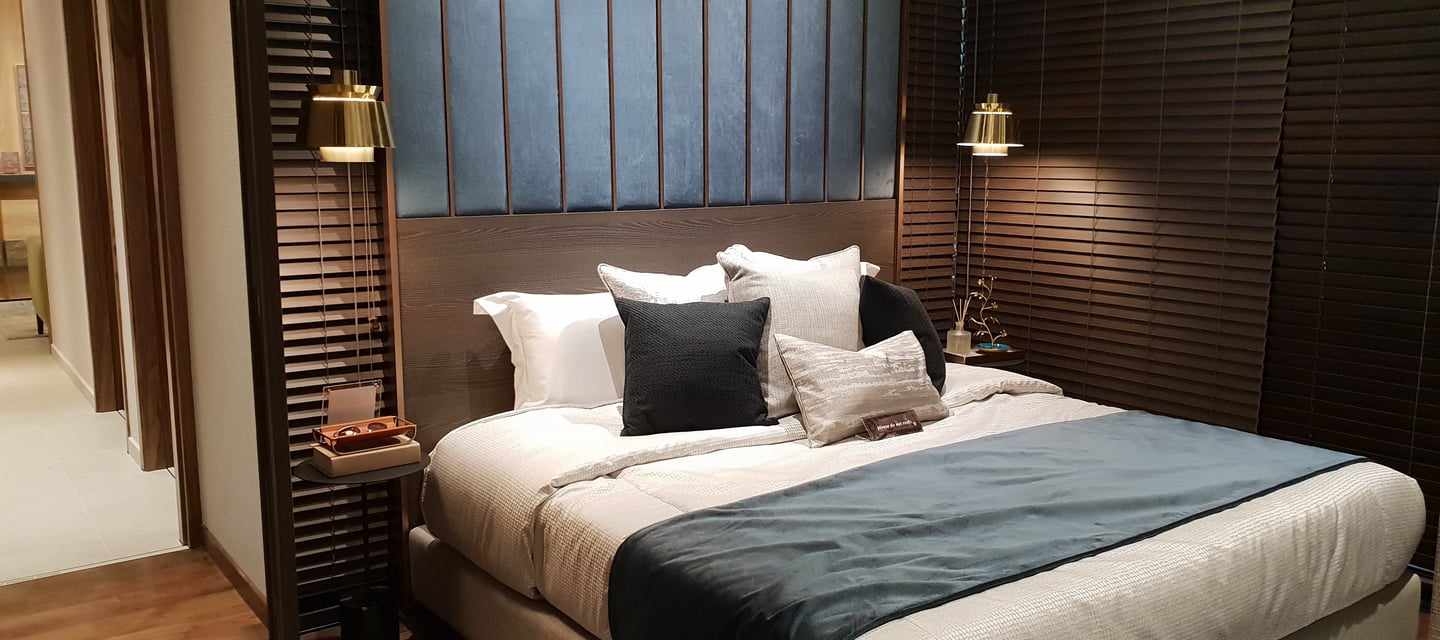 a bed with a bed and a lamp