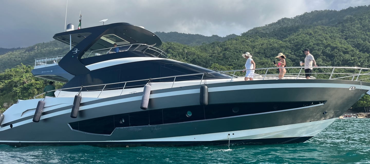 a boat with people on it in the water
