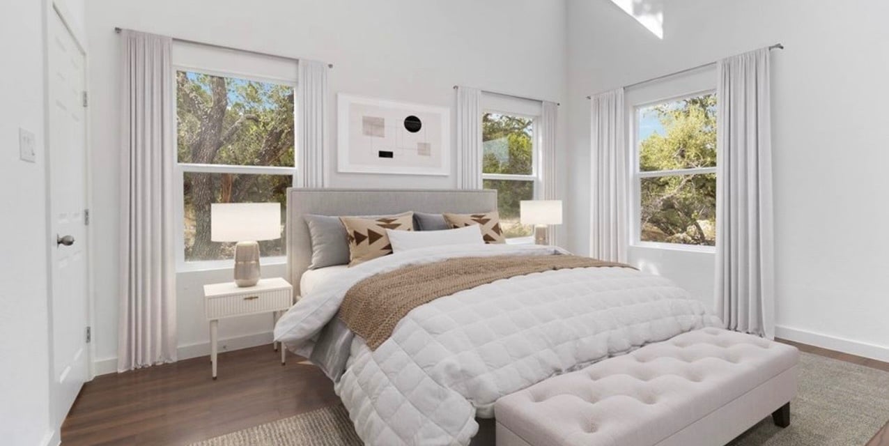 AI-staged primary bedroom with spacious layout and modern design in custom Texas home