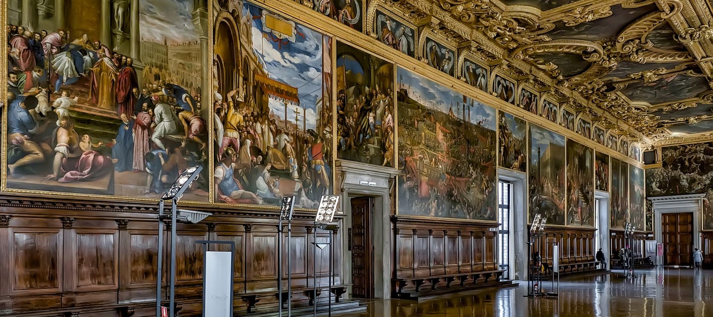 a large room with a lot of paintings on the walls