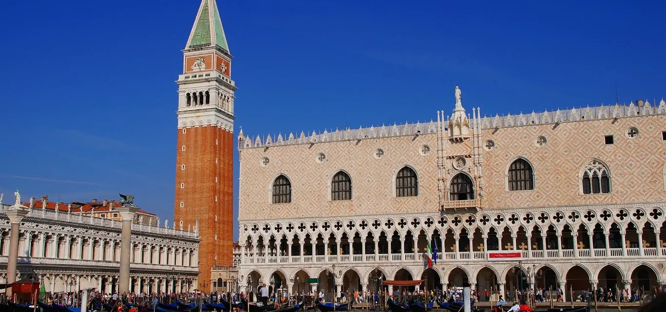 a large building with a clock tower in the middle of it