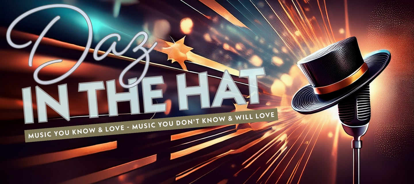 a microphone and a hat on a stage with the title "Daz in the Hat".