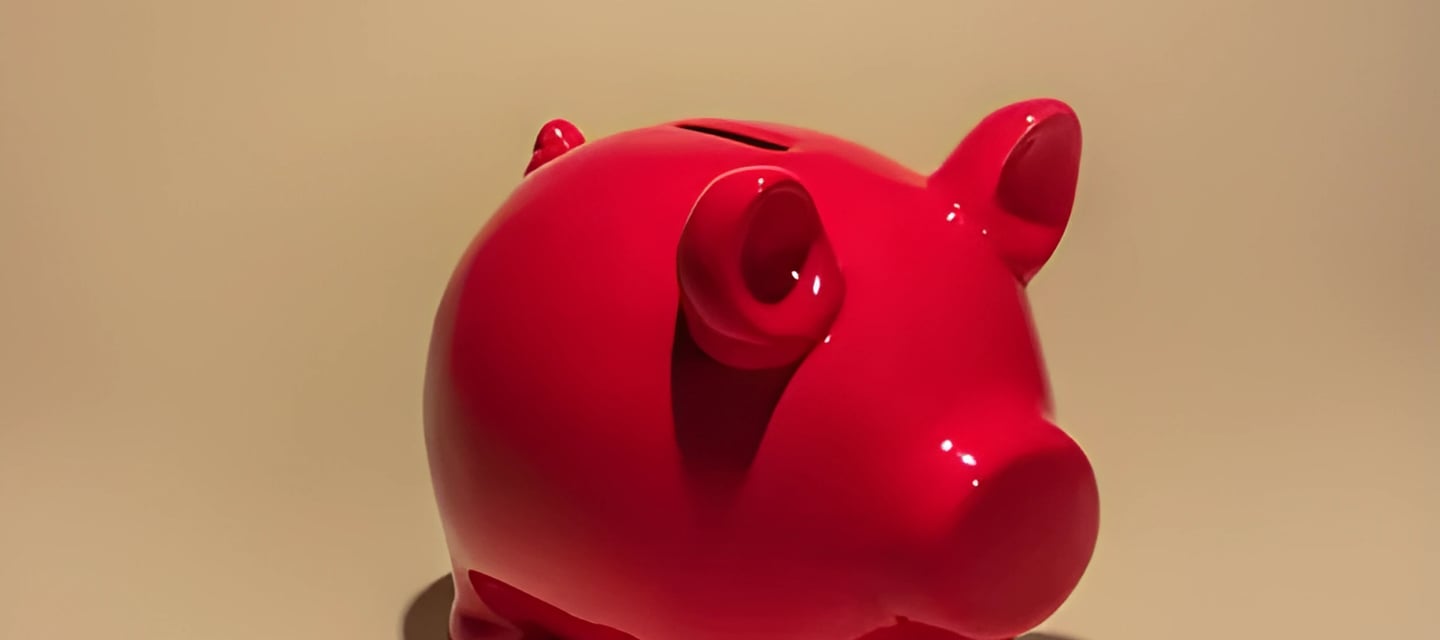 Vibrant red piggy bank symbolizing savings and financial planning for overseas education loans